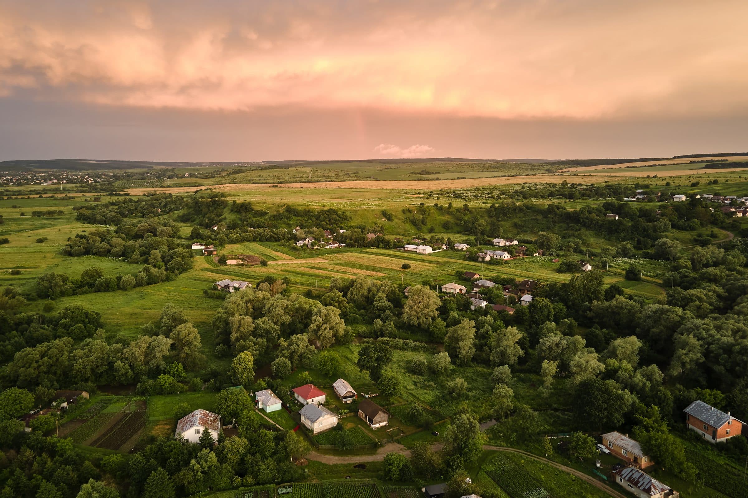 An aerial view of a rural community at dusk
